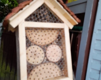 Insect hotel made of larch