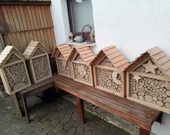 Larch insect hotels. Sun, moon and stars and the heart and leaf.