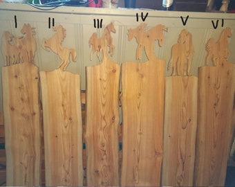 Horses as a fence or gate. Made of larch, 2.5 cm thick.