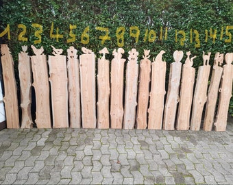 Decorative fence approx. 1.40 m high and approx. 1.30 m wide. Made of larch.