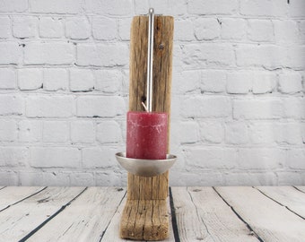 Candlestick made of driftwood and trowel