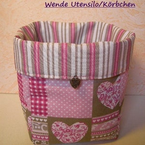 May include: A pink and brown fabric storage basket with a heart pattern and the text "ebook / Nähanleitung Wende Utensilo/Körbchen by sockenstricksucht1".
