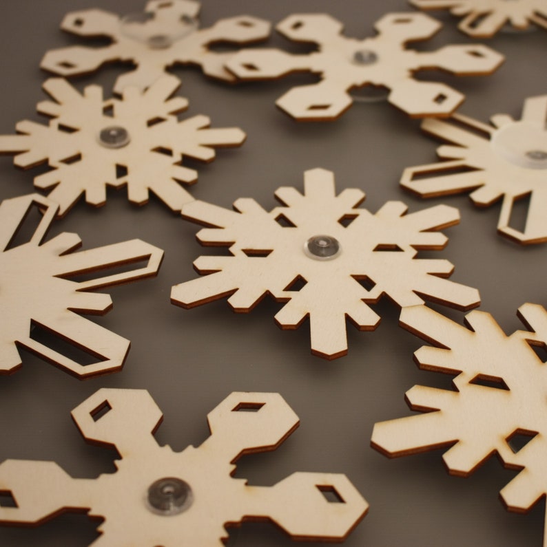 Set Of 9 Wooden Snowflakes Window Decorations, Wooden Christmas decorations, Lasercut Snowflakes, Festive Window display, image 2