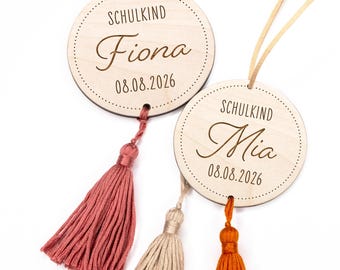 Etichetta con nome Schoolchild 2026 per coni scolastici con nappa