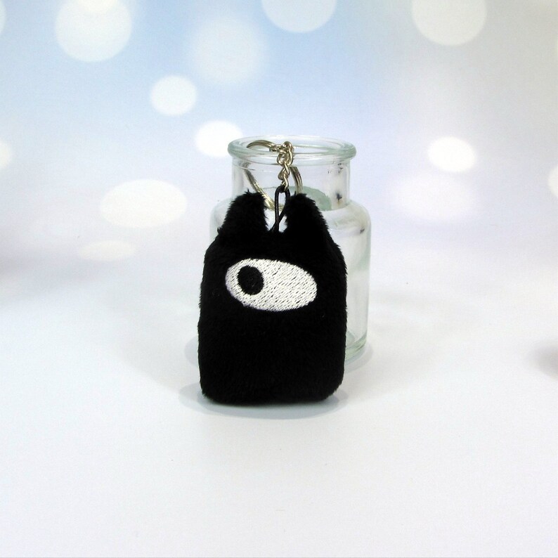 Little Demon keychain with bottle