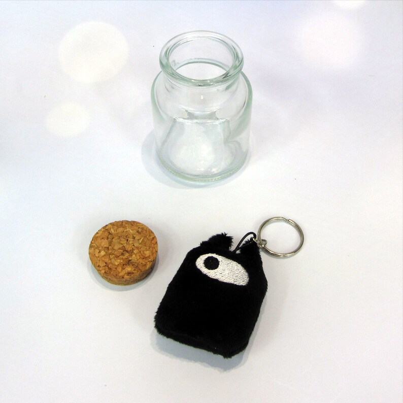 Little Demon keychain with bottle