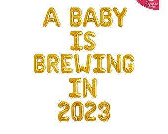 A baby is brewing in 2023 Balloon Banner | 2023 Baby Shower Banner | Baby Announcement Decors