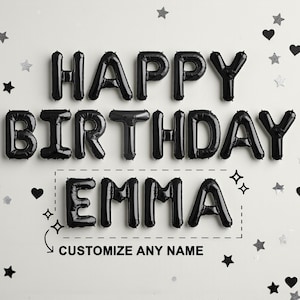May include: Black foil letter balloons spelling out HAPPY BIRTHDAY EMMA. The text CUSTOMIZE ANY NAME is printed below the name. The design is accented with small black heart and star shapes scattered around the letter balloons.