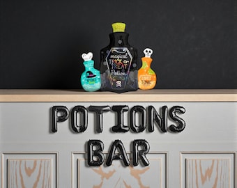 May include: Halloween-themed potion bottles with the text "magical TRICK or TREAT POTION" and "ZOMBIE TONIC". The bottles are black, orange, and teal, with decorative elements. Below, black balloon letters spell "POTIONS BAR".