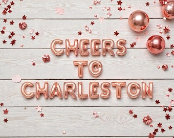 Banner de globos "Cheers to Charleston": Decoración sureña para despedida de soltera