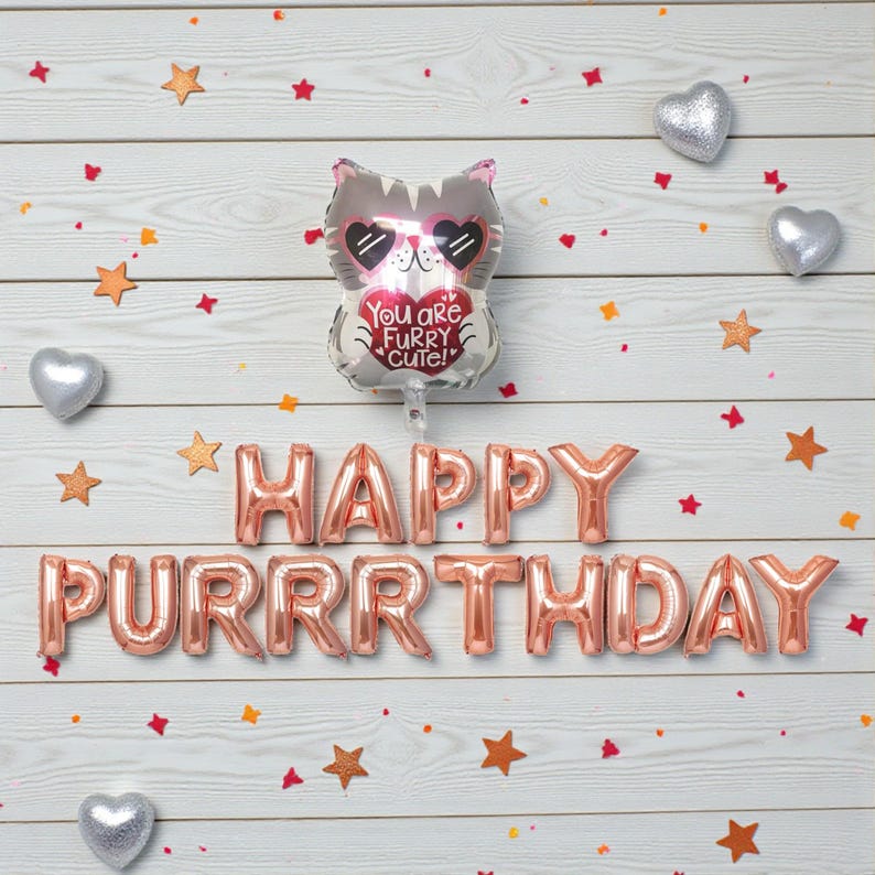 Puede incluir: Un arreglo festivo de cumplea&ntilde;os con un globo con forma de gato con gafas de sol en forma de coraz&oacute;n, el texto "You are Furry Cute!" y globos de letras de papel de aluminio en oro rosa que deletrean "HAPPY PURRRTHDAY". Decorado con estrellas y corazones.
