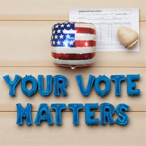 May include: A white ceramic mug with a black handle and the text "But First, Coffee" in a handwritten style. The mug is on a white surface. The mug is approximately 4 inches tall.