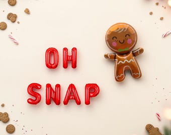 May include: Red foil balloons spelling the text OH SNAP arranged next to a brown gingerbread man character balloon. The scene is decorated with small scattered gingerbread cookie pieces, red ornaments, and candy cane segments.