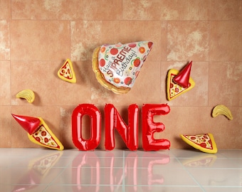 May include: A festive birthday decoration set featuring red balloons spelling "ONE" and pizza-shaped balloons. A large pizza slice balloon with the text "Have a Supreme Birthday" is also present. Additional pizza and chip-shaped balloons complete the party theme.
