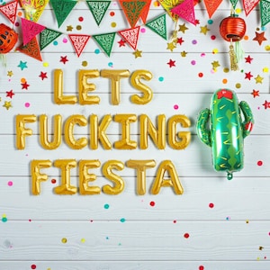 May include: A festive scene with gold foil balloon letters spelling "LET'S FUCKING FIESTA" on a white wooden surface. A green cactus balloon and colorful confetti and star decorations complete the party theme.