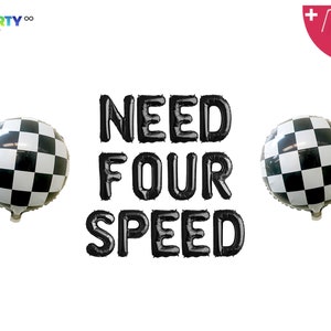 May include: Black foil balloons spelling "NEED FOUR SPEED" with two checkered flag balloons on either side. The balloons are for a racing or car-themed party. Includes a balloon straw and string.