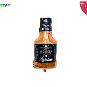 May include: A rose gold foil balloon in the shape of a whiskey bottle. The balloon features black labels with the text "Happy Birthday" and "Aged to Perfection". Includes a balloon straw and string.