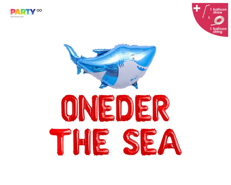 May include: A blue and white shark-shaped balloon floats above red balloon letters spelling "ONEDER THE SEA." The image includes a balloon straw and string, perfect for a first birthday party. The party supply is on a white background.