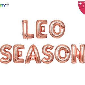 May include: Rose gold foil balloons spelling out "LEO SEASON" against a white background. The balloons are inflated and ready for a party. Includes a balloon straw and string. PartyEight.com logo in the top left corner.