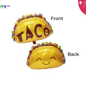 May include: A yellow taco-shaped foil balloon with the word "TACO" printed on the front and a smiley face on the back.