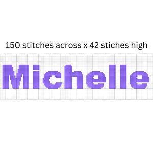May include: A pixel art design of the name "Michelle" in purple on a white grid background. The design is 150 stitches across and 42 stitches high.