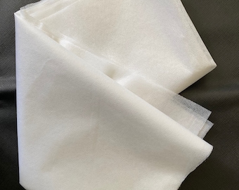 White Fusible UF363 Midweight Interfacing (36"X 60") . Nonwoven