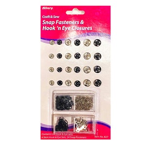 May include: A package of black and silver snap fasteners and hook and eye closures. The package includes 24 snap fasteners, 2 hook and eye sets, and 4 skirt hook and eye sets. The package is labeled "Allary Craft & Sew Snap Fasteners & Hook 'n Eye Closures" and "Item No. 827".