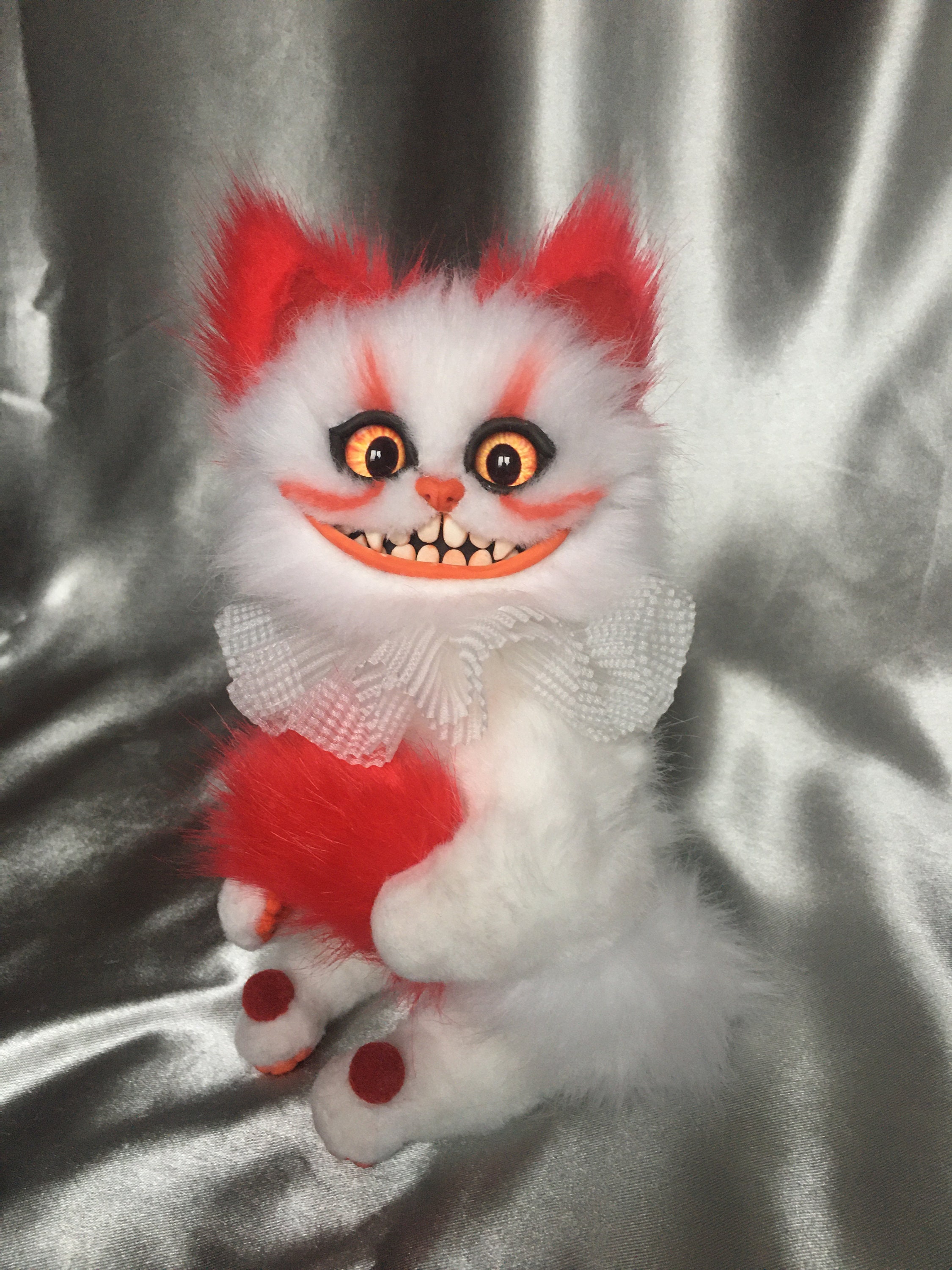 cat dressed as pennywise