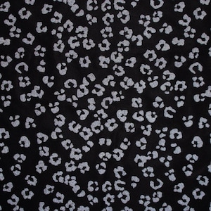 18,90 EUR/m reflektierender Nano - Softshell mit Leomuster, Sakura, schwarz, 300299
