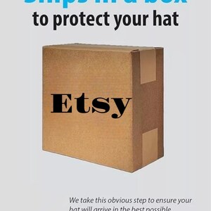 May include: A brown cardboard box with the word "Etsy" printed on it. The box is labeled "Ships in a box to protect your hat".