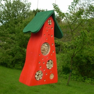 Insect hotel colored red/green