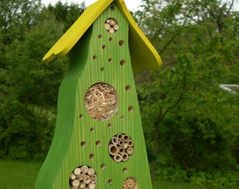 Insect hotel, colored light green/yellow