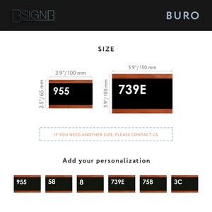 May include: Two sizes of wooden framed black chalkboard signs with white text. The smaller sign is 2.5 inches by 3.9 inches and reads "955". The larger sign is 5.9 inches by 3.9 inches and reads "739E".