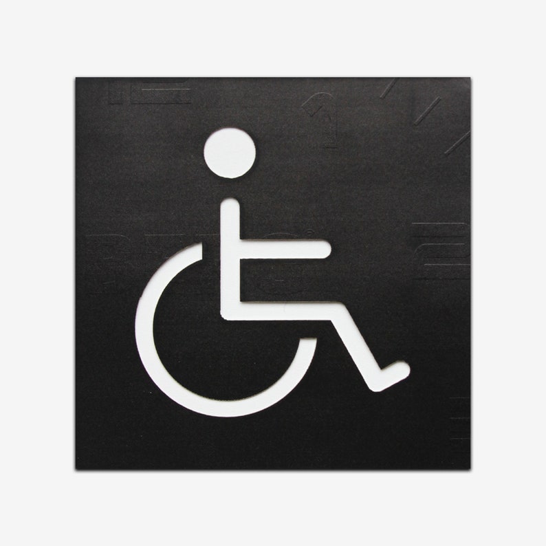 May include: A white wheelchair accessibility symbol on a black background.
