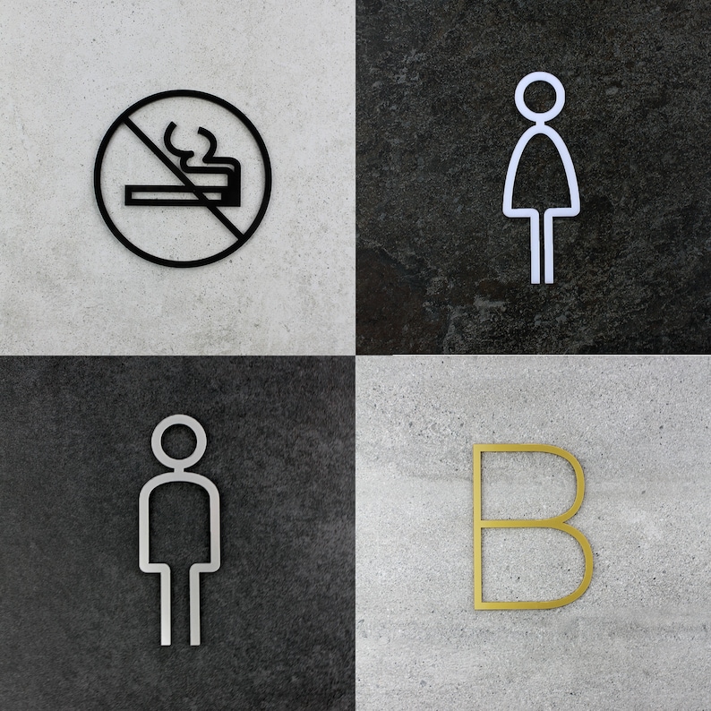 Puede incluir: Cuatro carteles en blanco y negro sobre un fondo blanco. El cartel superior izquierdo es un c&iacute;rculo con una l&iacute;nea que lo atraviesa y un cigarrillo con humo saliendo de &eacute;l. El cartel superior derecho es una figura de palo de una persona con un c&iacute;rculo para la cabeza. El cartel inferior izquierdo es una figura de palo de una persona con un c&iacute;rculo para la cabeza. El cartel inferior derecho es una letra B dorada.