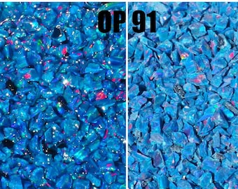 May include: A close-up image of blue opal chips, showing the difference in color when wet and dry. The text "OP 91" is visible at the top of the image. The text "Wet" is visible at the bottom left of the image. The text "Dry" is visible at the bottom right of the image.