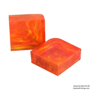 May include: Two blocks of orange, yellow, and red resin with a marbled pattern.  Heavenly Opal HO-30 Opal and Findings.com