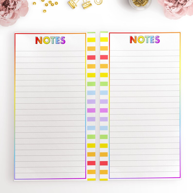 May include: Two blank lined pages with the word "NOTES" in rainbow letters at the top of each page. The pages are bordered with a rainbow stripe.