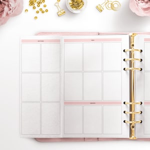 Op de afbeelding: Een roze lederen planner met gouden ringen en een witte pagina open naar een sectie met de labels "Bottoms", "Tops" en "Dresses".