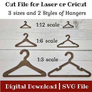 May include: Wooden hanger cut files for laser or Cricut machines. The image shows three sizes and two styles of hangers, labeled 1:12, 1:6, and 1:3 scale. The text at the top reads "Cut File for Laser or Cricut" and "3 sizes and 2 Styles of Hangers."