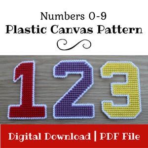 May include: Plastic canvas pattern featuring the numbers 1, 2, and 3. Number 1 is red with a white border, number 2 is purple with a white border, and number 3 is yellow with a white border. The text "Numbers 0-9 Plastic Canvas Pattern" is at the top.
