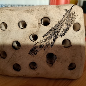 Handmade ceramic bee stone