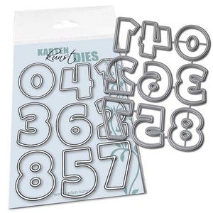 Könnte beinhalten: Ein Satz von 10 Zahlen aus Metall zum Basteln. Die Zahlen sind silberfarben und in einem Raster auf weißem Hintergrund angeordnet. Die Zahlen sind von 0 bis 9.