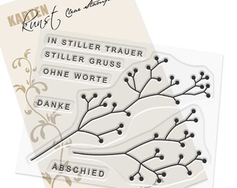 May include: Clear stamps with a floral design and the words "In stiller Trauer", "Stiller Gruss", "Ohne Worte", "Danke", and "Abschied".