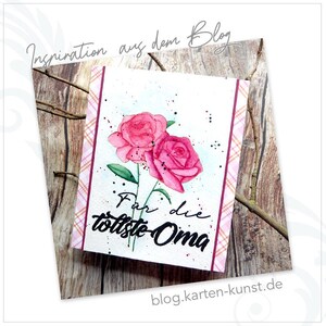 May include: A white card with two pink watercolor roses and the text "F&uuml;r die tollste Oma" on a wooden background.