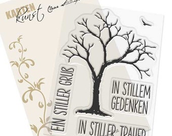 May include: Clear stamp set with a bare tree silhouette and the text "Ein stiller Gruß", "In stillem Gedenken", and "In stiller Trauer".