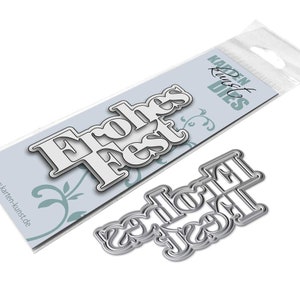 May include: Two metal die-cut stencils for crafting. The larger stencil says "Frohes Fest" and the smaller stencil says "Frohes Fest". The stencils are packaged in a clear plastic bag with a white label that says "Karten Kunst Dies".