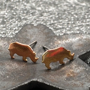 brass rhinoceros earrings