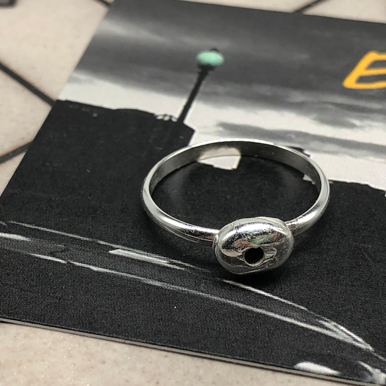 silver ring with black spinel