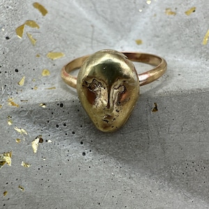 Gesichter Ring aus Messing